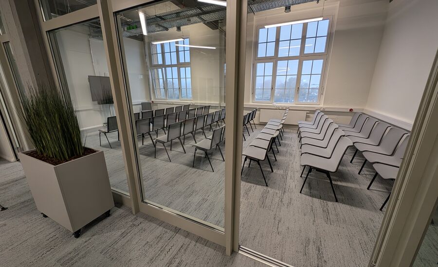 Reihenbestuhlung im Glasmeetingraum
