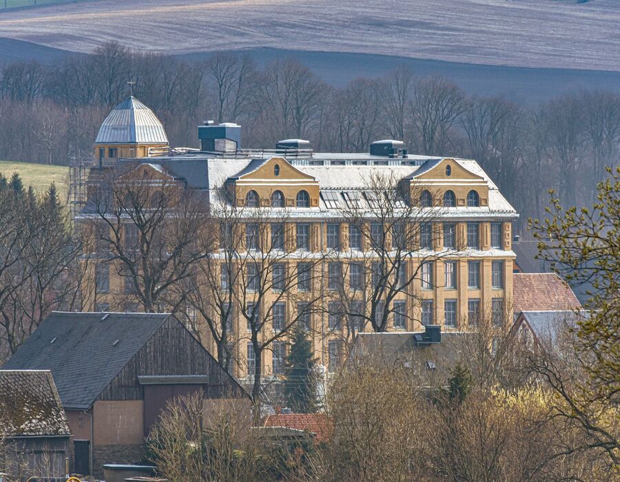 Luftaufnahme des Buntspeicher-Gebäudes im Bau, aufgenommen von einer Drohne